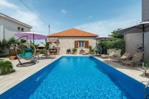Beachfront Holiday home Delight with private pool